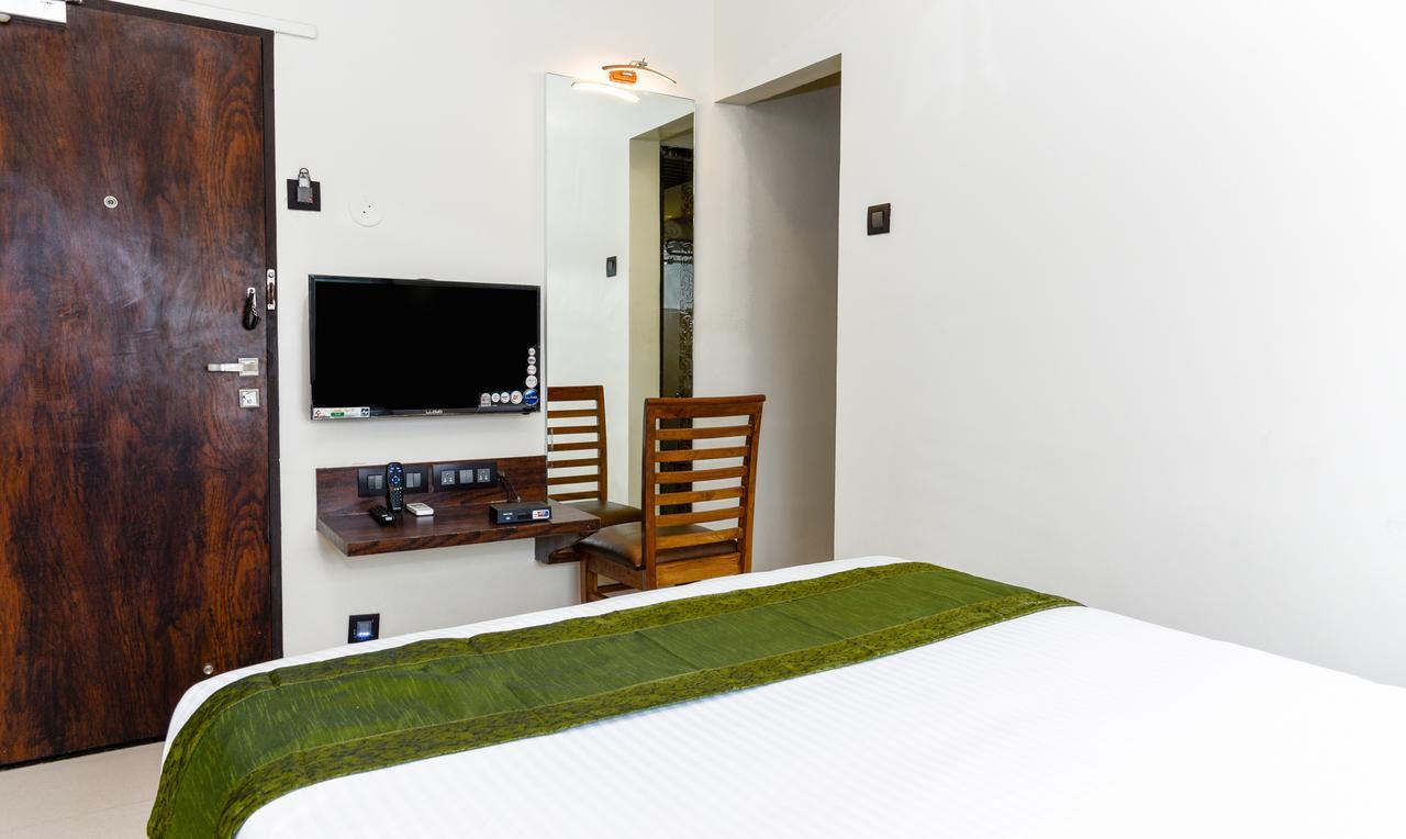 Отель Treebo Malhaar Regency Chinchvad Экстерьер фото
